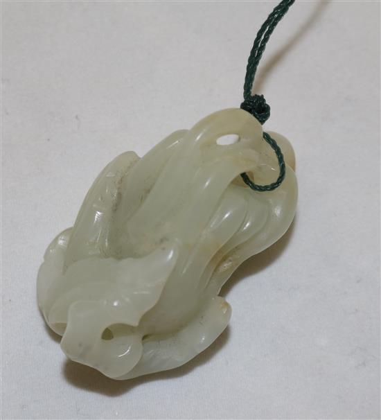 A Chinese pale celadon jade carving of a finger citron, 19th century, 4cm